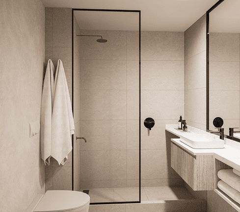 Baño moderno con ducha vidriada, revestimientos en tonos beige y mueble flotante de madera clara.