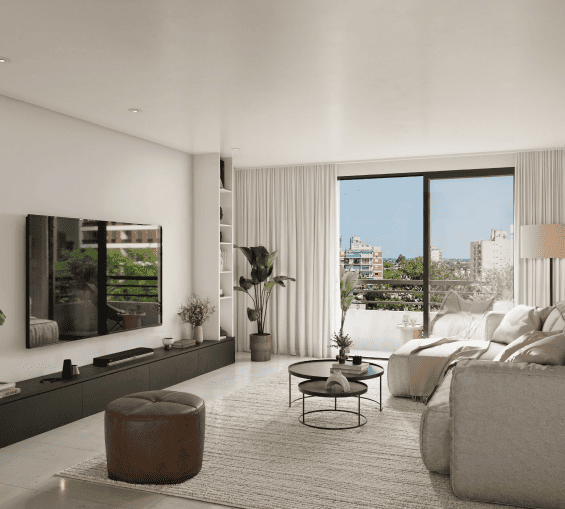 Living moderno y luminoso con sillones, mesa de centro, TV empotrada y grandes ventanales con vista a la ciudad.