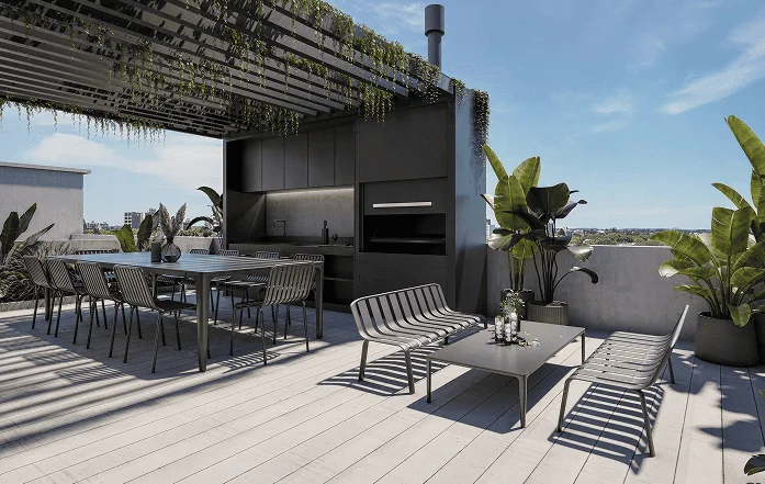 Terraza moderna al aire libre con comedor, parrilla integrada.